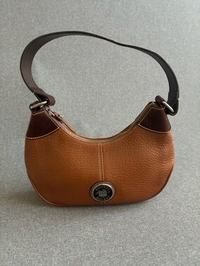 Dooney & Bourke Brown Pebbled Leather Crossbody with Silver Logo Coin